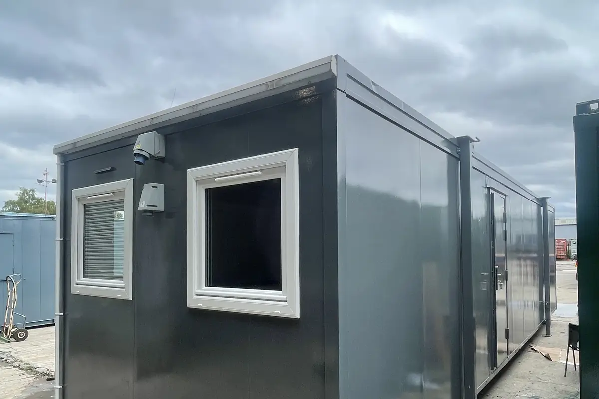 Multi-bay modular building compound standing on a cleared site