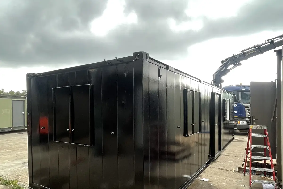 Used modular building being assessed in a yard before it is bought or removed